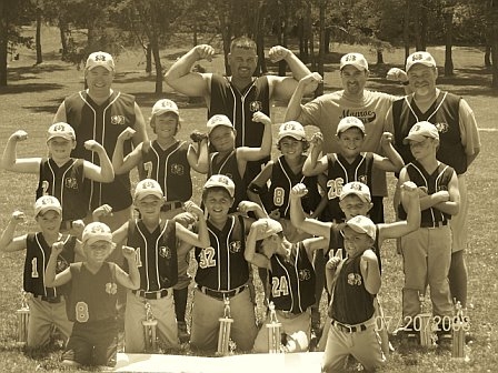 Monroe Blue Team Coach Pitch - Showing off their guns 